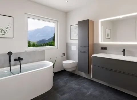 Ein elegant gestaltetes Badezimmer in Grau- und Weißtönen mit moderner Ausstattung und klaren Linien.